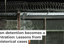 Barbed wire surrounds the GEO Group ICE detention facility in Adelanto, Calif. on July 10, 2025. Patrick T. Fallon/AFP via Getty Images